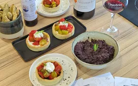 Olive bread sticks, olive tapenade, tomato and goat cheese tarts, Vinsobres wine