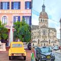 An old post office and a church in Beaune, France