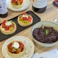 Olive bread sticks, olive tapenade, tomato and goat cheese tarts, Vinsobres wine