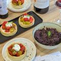 Olive bread sticks, olive tapenade, tomato and goat cheese tarts, Vinsobres wine